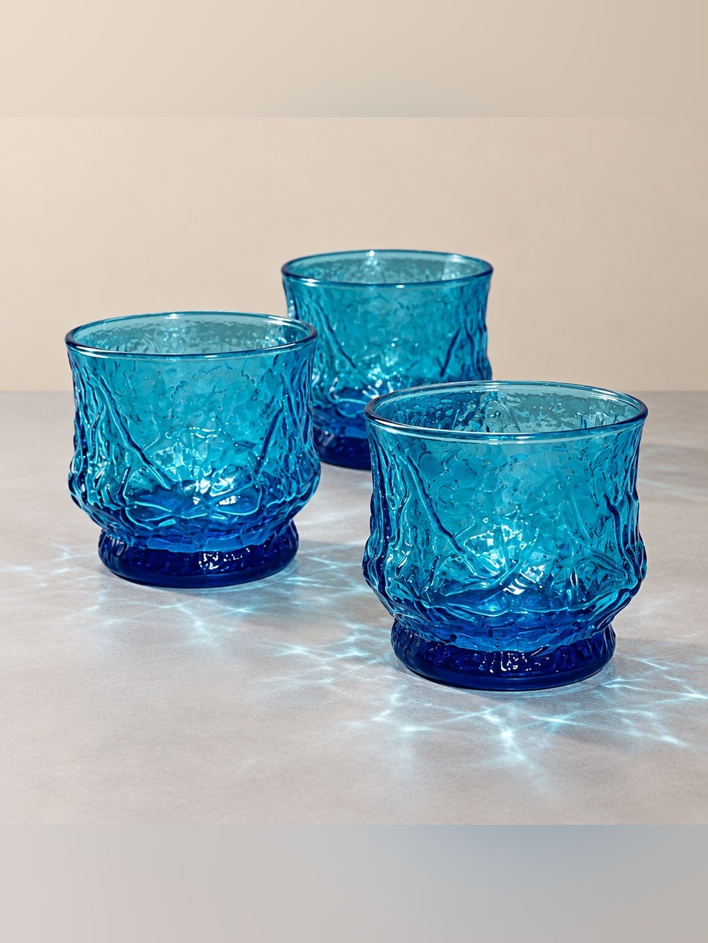 Set of 3 Anchor Hocking "Rain Flower" glasses in Laser Blue.